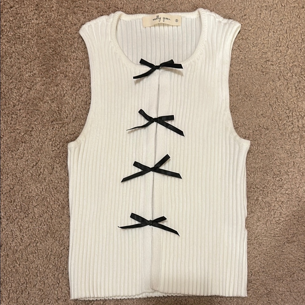 Stylish White Sleeveless Top with Black Accents